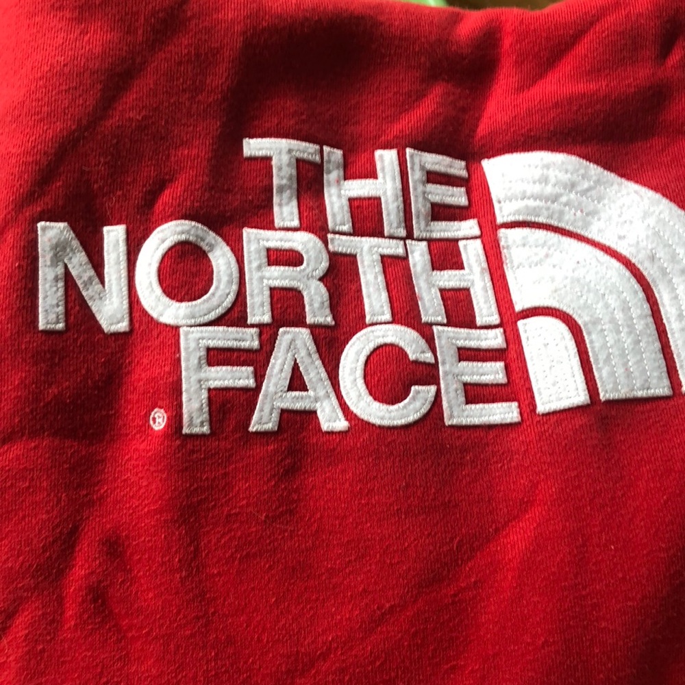 Men’s red north face hoodie, size L